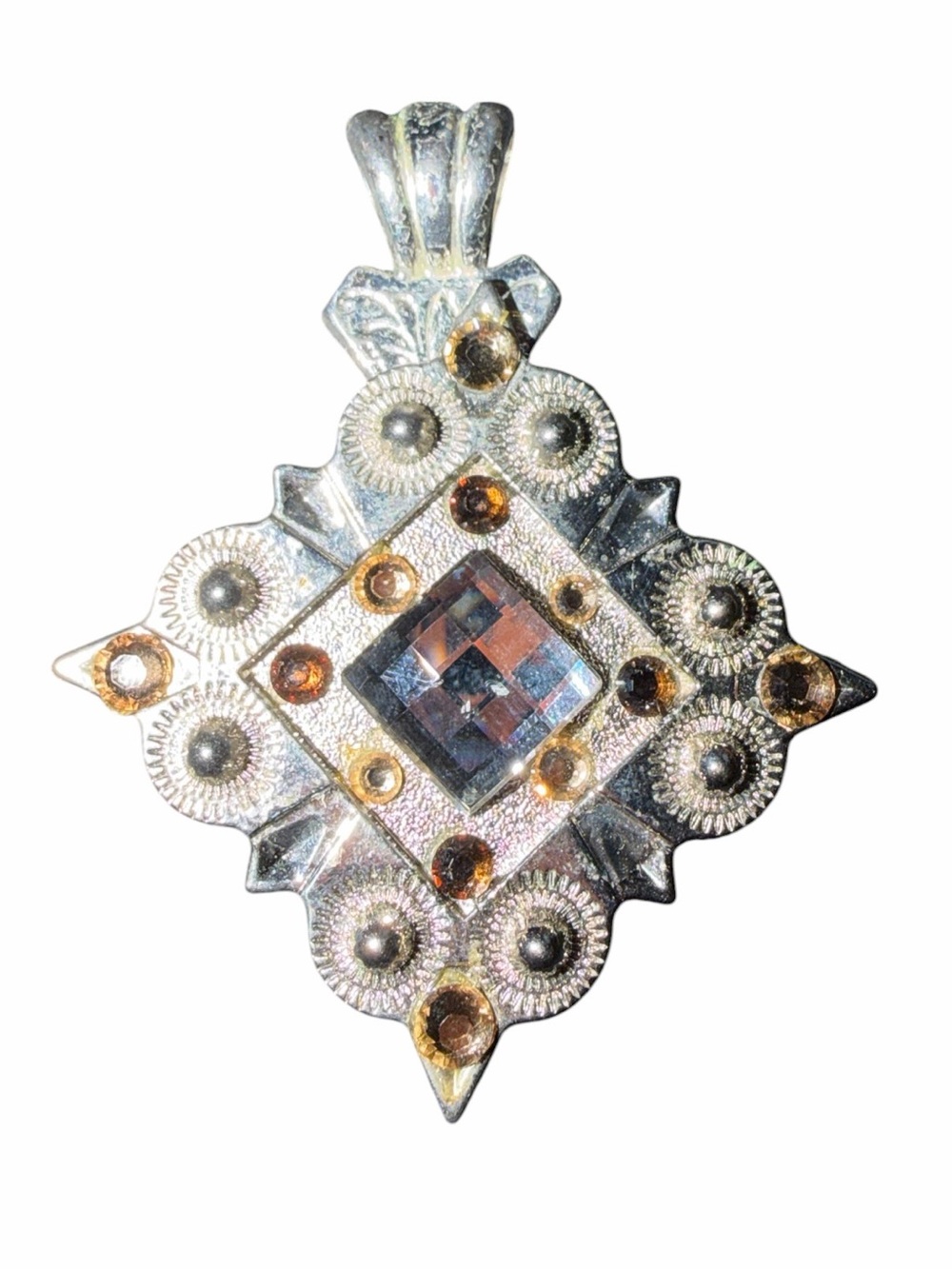 Silver-Tone Filigree Pendant with Amber Accents